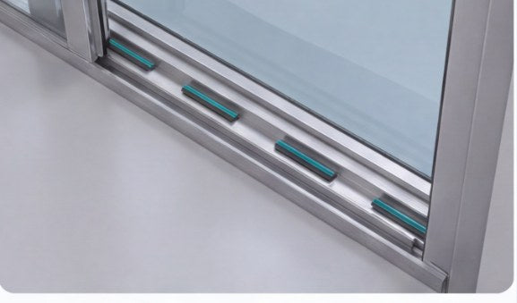 Four adaptor assemblies placed along the door